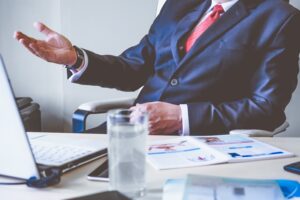 Why do companies participate in international business transactions?