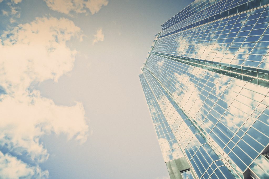 blue sky in reflection of the building