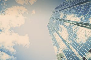 blue sky in reflection of the building