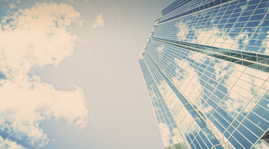 blue sky in reflection of the building