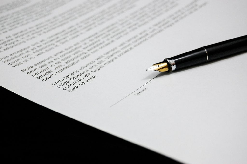 pen on contract
