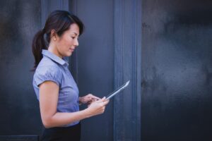 Woman reading on tablet