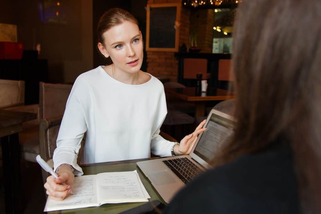 Business Meeting between two women