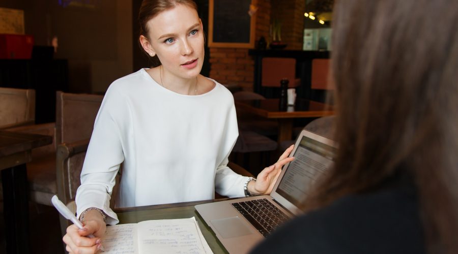 Business Meeting between two women