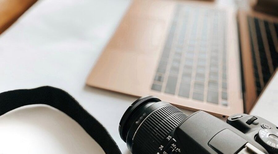 laptop and professional camera