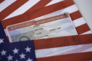 Employment Authorization card on USA Flag