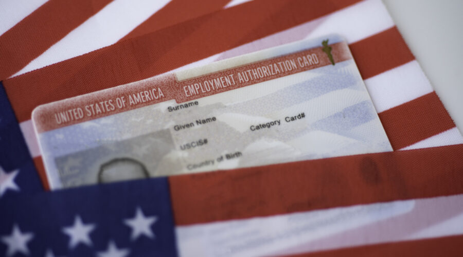 Employment Authorization card on USA Flag